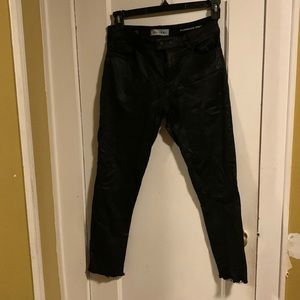 Coated black jeans